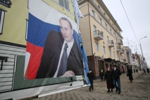 Putin na fasádách nově opravených domů.